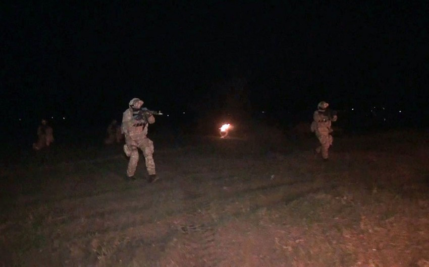 Azerbaijan's Special Forces fulfill tasks at nighttime during exercises held in southern region