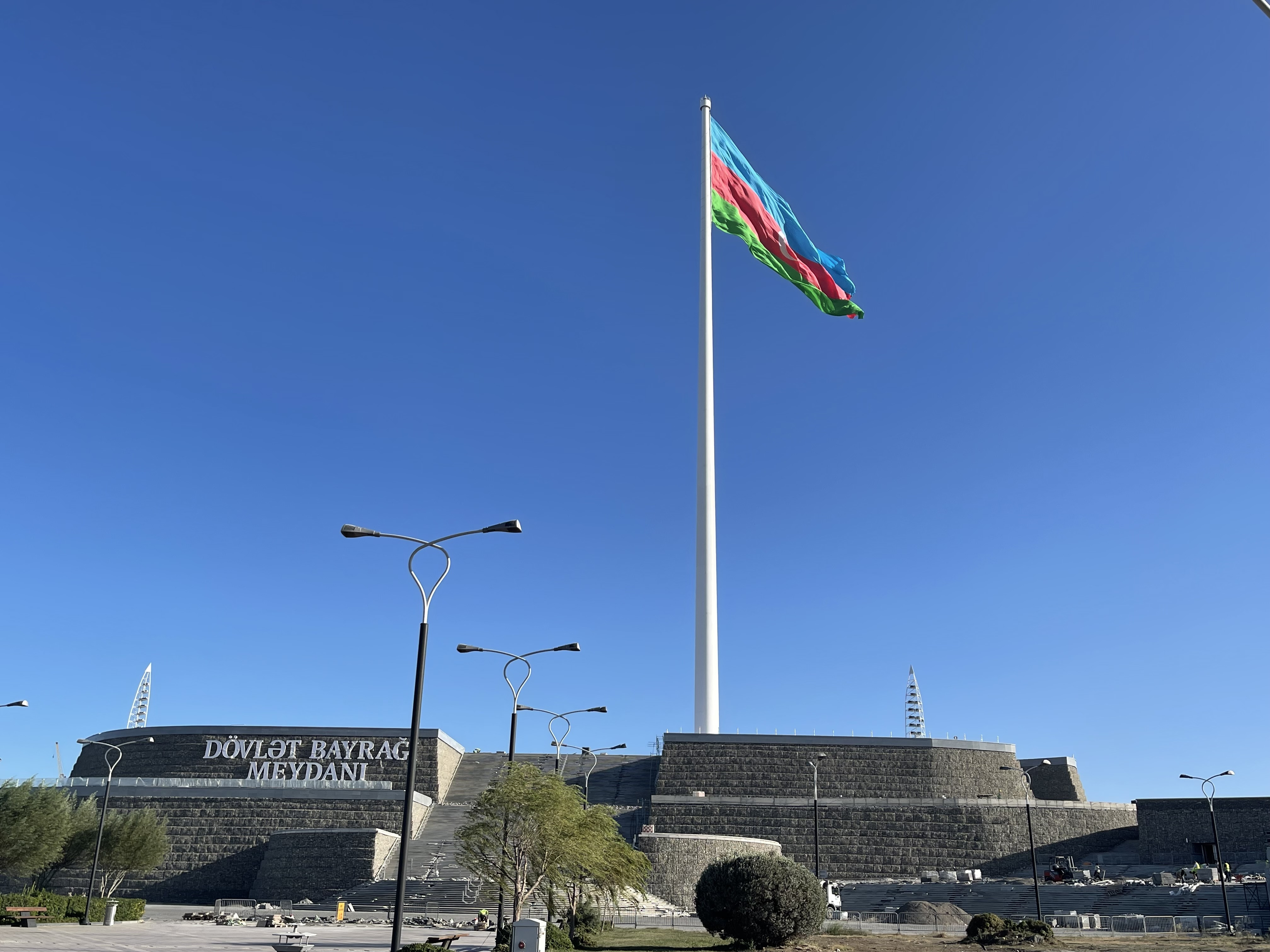President Ilham Aliyev raises Azerbaijan's tricolor Flag at State Flag Square in Baku